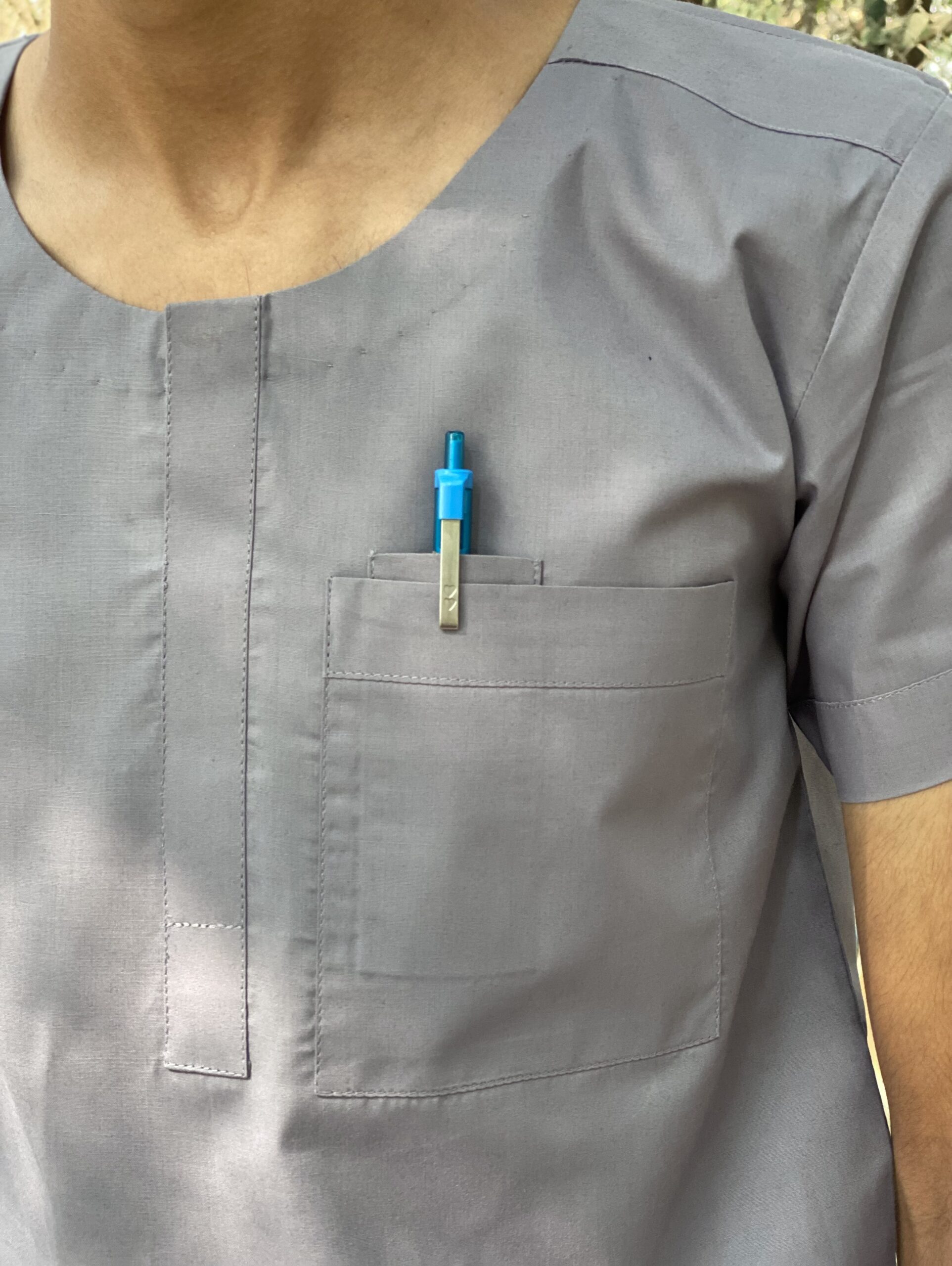 GREY ROUNDED NECK AND SHOLDER PEN POCKET